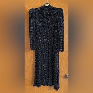 Black with white dots dress for women. Banana Republic brand. Size 10 PETITE.